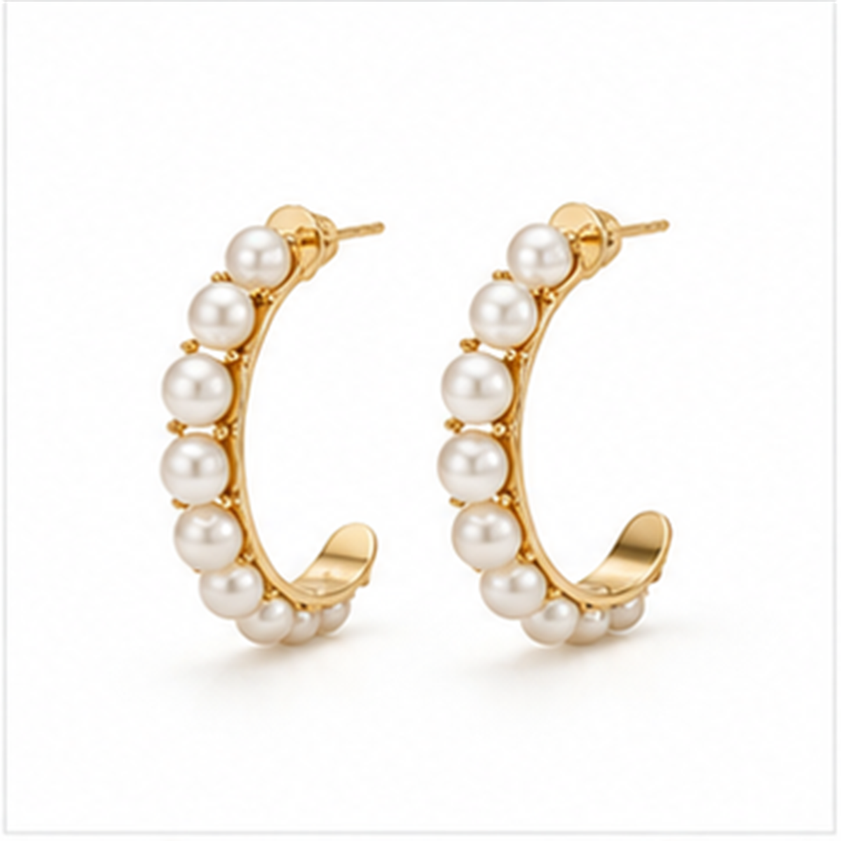 Pearl Arc Earrings on a white background